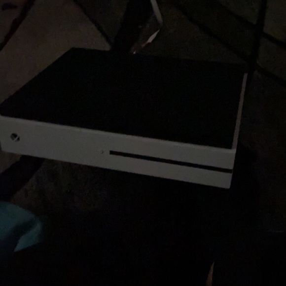 Xbox 1 with a lot of games on it that I bought with 2 controller